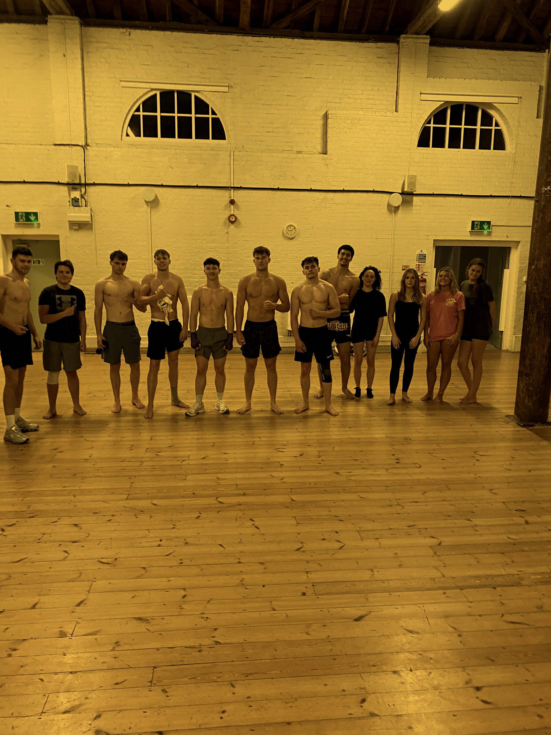 Torus club members together in the training hall